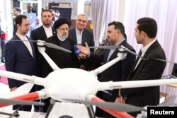 Iran's President Ebrahim Raisi visits Iran's "House of Innovation and Technology" exhibition in Nairobi, Kenya, July 12, 2023. Iran's Presidency/WANA (West Asia News Agency)/Handout via Reuters