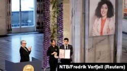 Ali and Kiana Rahmani, children of Narges Mohammadi, an imprisoned Iranian human rights activist, accept the Nobel Peace Prize 2023 award on behalf of their mother at Oslo City Hall, Norway.