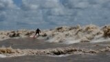 APTOPIX Brazil Amazon Surfing