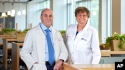 In this undated image from Penn Medicine, Katalin Karikó and Drew Weissman pose at the University of Pennsylvania in Philadelphia. The two won the Nobel Prize in medicine on Oct. 2, 2023, for discoveries that enabled the creation of mRNA vaccines.