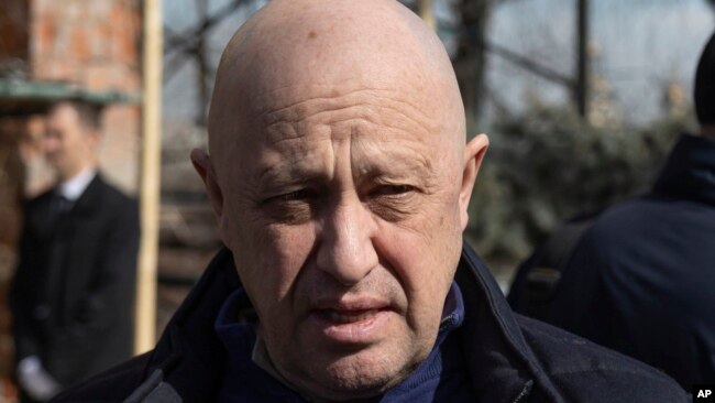 FILE - Yevgeny Prigozhin, the owner of the Wagner Group military company, arrives during a funeral ceremony at the Troyekurovskoye cemetery in Moscow, Russia, on April 8, 2023.