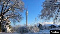 Snow covers the Olympic park after heavy snowfall hit Bavaria and its capital, Munich, Germany, Dec. 3, 2023. 