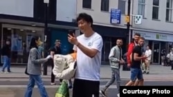 英國修咸頓（Southampton）其中一名襲擊香港人的 中國留學生在事發前被參加集會的人拍攝到面容（集會參加者提供照片）