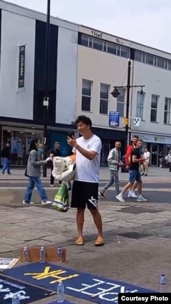 英国南安普顿其中一名袭击香港人的查仇 中国留学生在事发前被参加集会的人拍摄到面容(集会参加者提供照片)