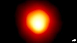 FILE - This image made with the Hubble Space Telescope and released by NASA on Aug. 10, 2020, shows the star Alpha Orionis, or Betelgeuse, a red supergiant. 