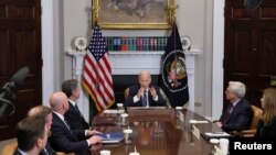 FILE - President Joe Biden holds a meeting about countering the flow of fentanyl into the United States, in the Roosevelt Room at the White House, in Washington, Nov. 21, 2023.