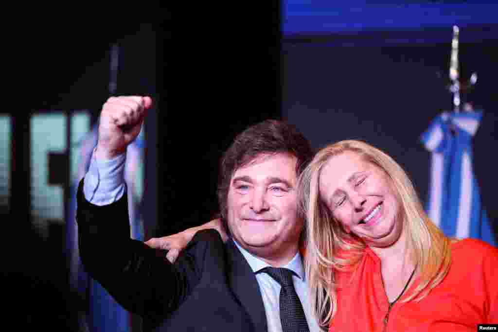 Argentine president-elect Javier Milei and his sister Karina Milei react to the results of the runoff presidential election, in Buenos Aires, Nov. 19, 2023. REUTERS/Agustin Marcarian