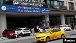 FILE - A visa application center of VFS Global is seen in Istanbul, Turkey, Aug. 25, 2022. 
