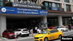 FILE - A visa application center of VFS Global is seen in Istanbul, Turkey, Aug. 25, 2022. 