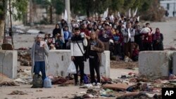 Palestinians flee to the southern Gaza Strip, on the outskirts of Gaza City, during the ongoing Israeli bombardment on Nov. 22, 2023.