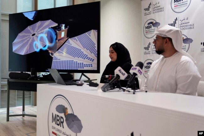 Mohsen Al Awadhi, director of UAE Space Missions Department, right, and Hoor AlMaazmi UAE, space science researcher, take part at a press conference, in Dubai, United Arab Emirates, May 29, 2023.