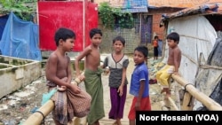 FILE - Rohingya children playing at a refugee camp in Cox's Bazar, Bangladesh. With violence increasing in the Rohingya camps parents are anxious about the future of their children.