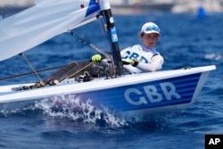 Hannah Snellgrove of Britain sails upwind during an ILCA 6 dinghy class practice, during the 2024 Summer Olympics on July 27, 2024, in Marseille, France.