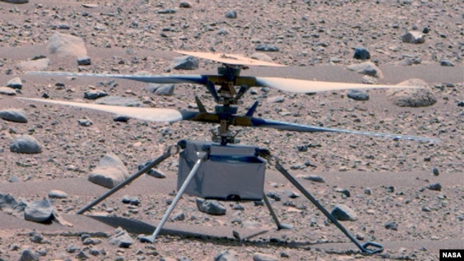 This enhanced color image of NASA's Ingenuity Mars Helicopter was taken by the This enhanced color image of NASA's Ingenuity helicopter was taken by the Mastcam-Z instrument aboard Perseverance on April 16, 2023. (NASA/JPL-Caltech/ASU/MSSS)