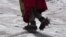 FILE - Aymara climbing guide Suibel Gonzales walks on the Huayna Potosi glacier near El Alto, Bolivia, Nov. 5, 2023. 