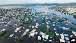 In this image made from video, flooded streets are seen from the air in the town of Beledweyne, Somalia, Nov. 19, 2023.