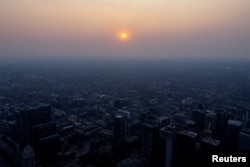 A smokey Toronto skyline is seen with a blanket of smoke from the CN Tower as wildfires in Ontario and Quebec continue to burn, in Toronto, Ontario, Canada, June 6, 2023
