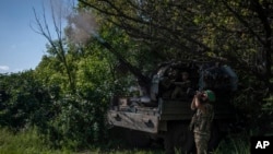 Ukrainian soldiers fire at the Russian air target on the frontline near Bakhmut, in the Donetsk region, Ukraine, June 5, 2023.