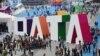 (FILE) Visitors walk past the giant word for "Data" during the Guiyang International Big Data Expo 2016 held in Guiyang in southwestern China.