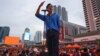 Move Forward Party leader and prime ministerial candidate Pita Limjaroenrat addresses supporters during a rally, in front of Central World in Bangkok on July 9, 2023. 