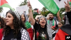 Palestinian supporters rally for Palestinians in Gaza, Oct. 13, 2023, in Miami. 