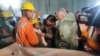 One of the trapped workers is checked out after he was rescued from a collapsed tunnel site in Uttarkashi in the northern state of Uttarakhand, India, Nov. 28, 2023. (Uttarkashi District Information Officer/handout via Reuters)