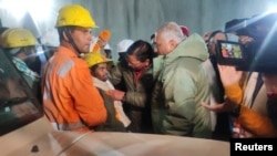 One of the trapped workers is checked out after he was rescued from a collapsed tunnel site in Uttarkashi in the northern state of Uttarakhand, India, Nov. 28, 2023. (Uttarkashi District Information Officer/handout via Reuters)