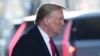 Former President Donald Trump leaves his apartment building in New York, Jan. 17, 2024, planning to attend the penalty phase of a civil defamation trial over a columnist's claims he sexually attacked her in a department store dressing room in the 1990s.