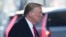 Former President Donald Trump leaves his apartment building in New York, Jan. 17, 2024, planning to attend the penalty phase of a civil defamation trial over a columnist's claims he sexually attacked her in a department store dressing room in the 1990s.