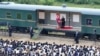 North Korean leader says thousands of flood victims will be brought to capital for care