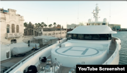 A screenshot from a video investigation by Alexey Navalny depicting the Sea & Us yacht in the port of Barcelona. (NavalnyRu Youtube page)