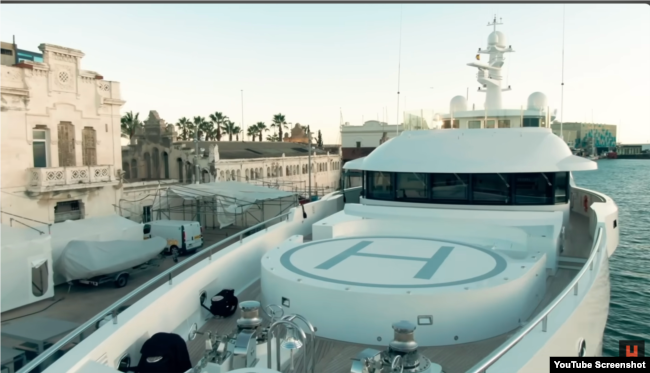 A screenshot from a video investigation by Alexey Navalny depicting the Sea & Us yacht in the port of Barcelona. (NavalnyRu Youtube page)