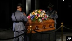 A Georgia State Patrol honor guard stands at the casket of former first lady Rosalynn Carter at the Jimmy Carter Presidential Library and Museum in Atlanta, Nov. 27, 2023, during the public repose. 