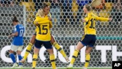 Sweden's Rebecka Blomqvist, left, celebrates scoring her side's 5th goal during the Women's World Cup Group G match between Sweden and Italy in Wellington, New Zealand, July 29, 2023.