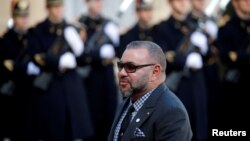 FILE - Morocco's King Mohammed VI arrives at the Elysee Palace in Paris, France, Dec. 12, 2017. Israel on July 17, 2023, became the second country to recognize Moroccan sovereignty over Western Sahara.