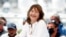 FILE - Jane Birkin poses during the 74th Cannes Film Festival, July 8, 2021. 