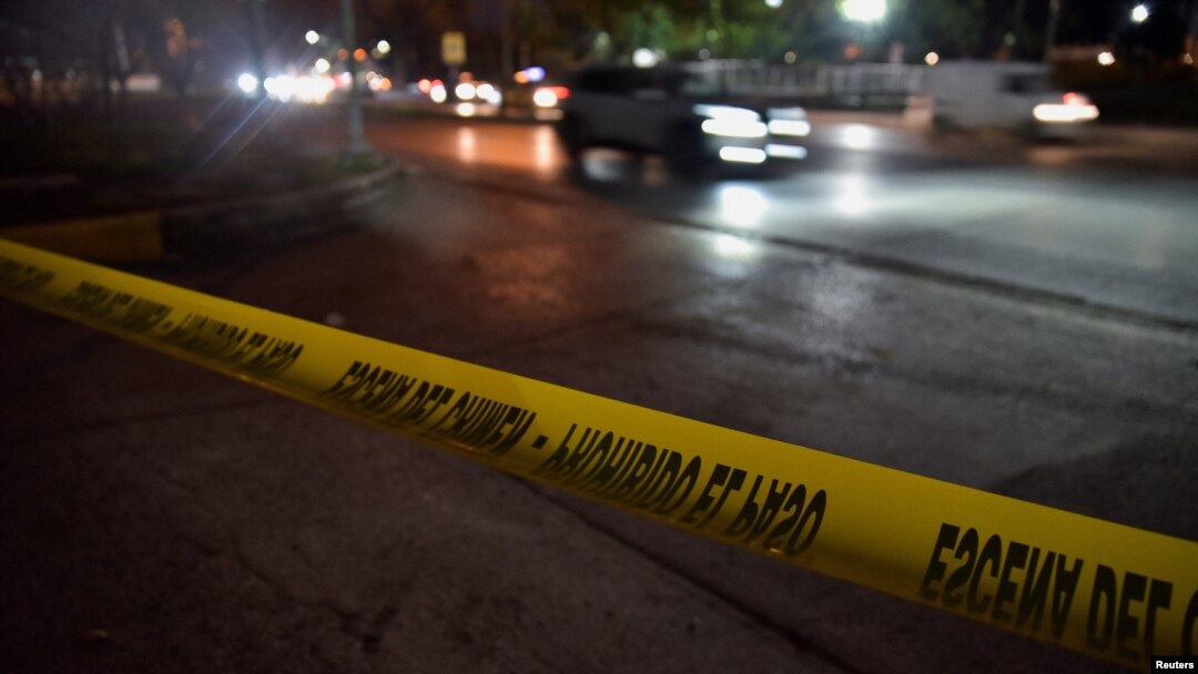 FILE - A police barricade tape is seen at a cordoned-off area where Ecuadorean prosecutor Cesar Suarez was killed, in Guayaquil, Ecuador, Jan. 17, 2024.