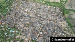 စစ်ကောင်စီနယ်မြေရှင်းလင်းရေးအတွင်း စစ်ကိုင်းတိုင်း စစ်ကိုင်းမြို့နယ်ထဲက မီးဘေးသင့်ကျေးရွာတရွာကိုတွေ့ရစဉ် (မေ၊ ၂၀၂၃)