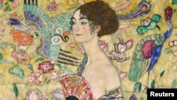 The last portrait Austrian artist Gustav Klimt painted before he died, "Lady with a Fan," sold at auction at Sotheby's in London, is seen in this undated handout image released June 26, 2023. (Sotheby's/Handout via Reuters) 