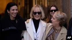 E. Jean Carroll, center, leaves federal court in New York, Jan 26, 2024. A jury has awarded an additional $83.3 million to Carroll, who says former U.S. President Donald Trump damaged her reputation by calling her a liar after she accused him of sexual assault.