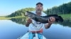 Angler Mike Sielicki holds a northern snakehead fish, which he caught in Potomac Creek in Fredericksburg, Virginia. (Photo courtesy Mike Sielicki) 