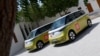 Volkswagen ID. Buzz vehicles are parked outside the venue hosting the Geneve International Motor Show (GIMS) in Doha on Oct. 1, 2023, after crossing through 12 countries to arrive in Qatar from Geneva. 
