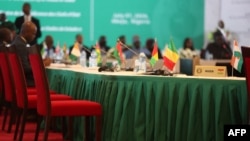 This photo shows the empty seat of Niger during an Economic Community of West African States meeting in Abuja, Nigeria, July 7, 2024. In January, aggrieved by ECOWAS sanctions, Niger, Mali and Burkina Faso left the bloc and later created a confederation.