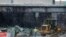 Crews continue to work the scene of a collapsed elevated section of Interstate 95 in Philadelphia, June 14, 2023. 