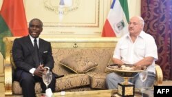 President of Belarus Alexander Lukashenko (R) is welcomed by Vice President of Equatorial Guinea Teodoro Nguema Obiang (L) upon his arrival for an official visit at the Malabo International Airport in Malabo on December 9, 2023. 