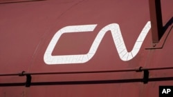 FILE - A weathered Canadian National Railway logo adorns a coil steel car in the Jackson, Mississippi, terminal rail yard, April 20, 2022. A new work stoppage for Canadian National is slated to start Aug. 26, 2024. 