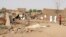 FILE: People check the rubble of their destroyed home after strikes at Allamat district in Khartoum, Sudan, June 1, 2023. The fighting in Khartoum has continued since then, and despite the U.S. - Saudi cease-fire brokered earlier. 