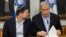 FILE - Israeli Prime Minister Benjamin Netanyahu, right, speaks with Minister of Finance Bezalel Smotrich during the weekly cabinet meeting at the Defense Ministry in Tel Aviv, Israel, Jan. 7, 2024.