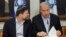 Israeli Prime Minister Benjamin Netanyahu, right, speaks with Minister of Finance Bezalel Smotrich during the weekly cabinet meeting at the Defense Ministry in Tel Aviv, Israel, Jan. 7, 2024.