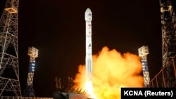 FILE — A rocket carrying a spy satellite is launched, as the North Korean government claims, in a location given as North Gyeongsang province, North Korea, in this handout picture obtained by Reuters on Nov. 21, 2023. Pyongyang reportedly is planning a similar launch on June 4.